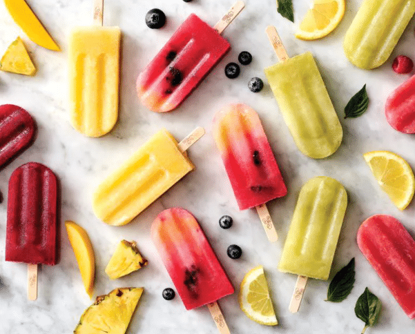 Apartments For Rent in Katy TX, Oak Park Apartments Colorful popsicles on a marble table at Oak Park Apartments in Katy TX.