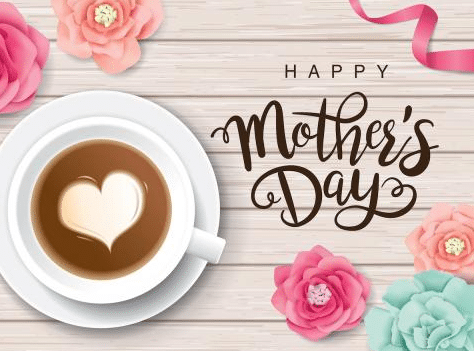 Apartments For Rent in Katy TX, Oak Park Apartments A cup of coffee and flowers on a wooden background with the message happy mother's day at Oak Park Apartments.