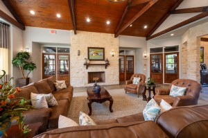Apartments For Rent in Katy, Texas - Clubhouse Interior Seating Area with Fireplace 
