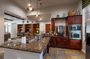 Apartments for Rent in Katy, Texas - Clubhouse Kitchen Interior, Breakfast Bar with view of Cyber Cafe     