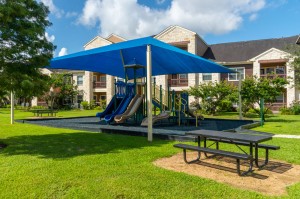 Apartments in Katy, Texas - Covered Childrens Playground Area with Picnic Table