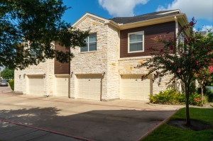 Apartments in Katy, Texas - Exterior Apartment Building with Attached Garages 